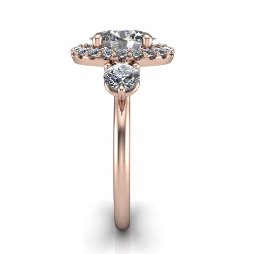 Carol oval three stone halo engagement ring in 14K Rose Gold, side profile showing the plain polished band and the three-stone halo head in profile