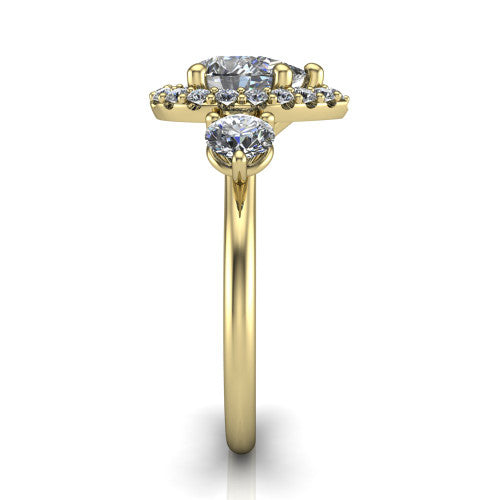 Carol pear three stone halo engagement ring in 18K Yellow Gold, side profile showing the plain polished band and the three-stone halo head in profile