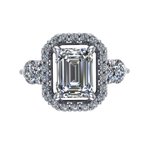Carol emerald three stone halo engagement ring in 14K White Gold, top-down view showing the squared pav&eacute; halo around the emerald center and the two round accent diamonds