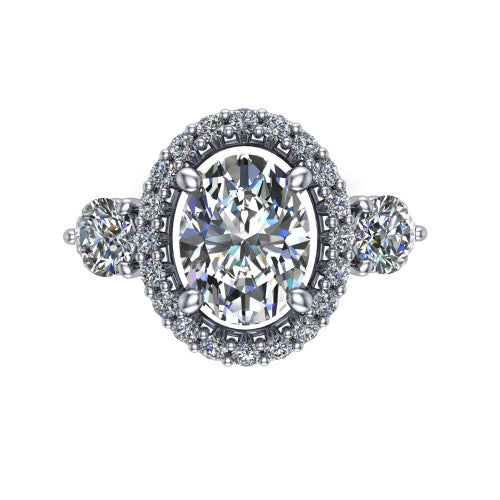 Carol oval three stone halo engagement ring in 18K White Gold, top-down view showing the squared pav&eacute; halo around the oval center and the two round accent diamonds