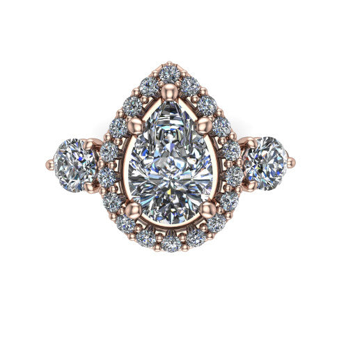 Carol pear three stone halo engagement ring in 14K Rose Gold, top-down view showing the squared pav&eacute; halo around the pear center and the two round accent diamonds