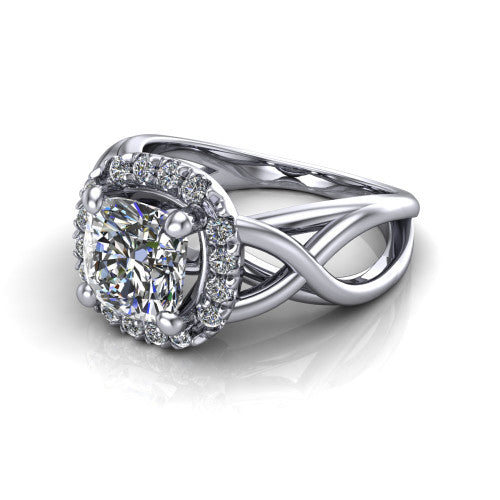 Coco cushion halo engagement ring in 18K White Gold, three-quarter perspective showing the cushion center in a squared pav&eacute; halo above a woven infinity split shank