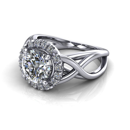 Coco round halo engagement ring in 18K White Gold, three-quarter perspective showing the round center in a squared pav&eacute; halo above a woven infinity split shank