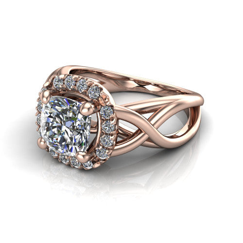 Coco cushion halo engagement ring in 14K Rose Gold, three-quarter perspective showing the cushion center in a squared pav&eacute; halo above a woven infinity split shank