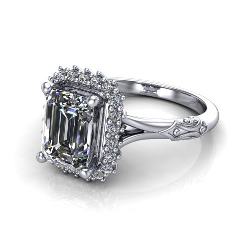Lillian emerald vintage halo engagement ring in 14K White Gold, three-quarter perspective showing the emerald center in a squared pav&eacute; halo above an engraved filigree band