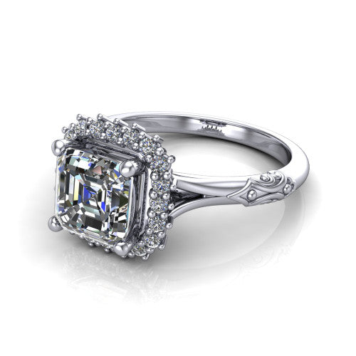 Lillian square emerald vintage halo engagement ring in Platinum, three-quarter perspective showing the square emerald center in a squared pav&eacute; halo above an engraved filigree band