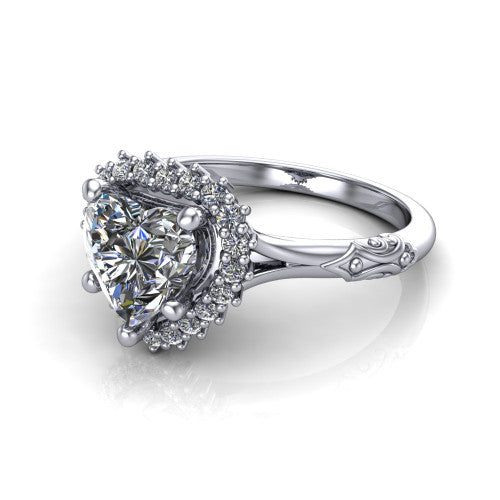 Lillian heart vintage halo engagement ring in Platinum, three-quarter perspective showing the heart center in a squared pav&eacute; halo above an engraved filigree band