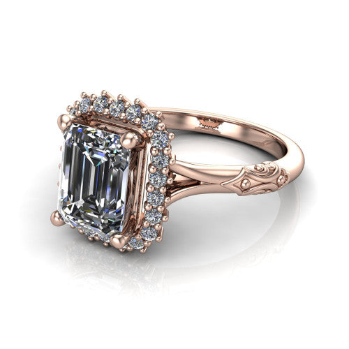 Lillian emerald vintage halo engagement ring in 18K Rose Gold, three-quarter perspective showing the emerald center in a squared pav&eacute; halo above an engraved filigree band