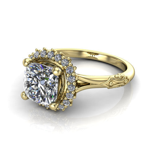 Lillian cushion vintage halo engagement ring in 18K Yellow Gold, three-quarter perspective showing the cushion center in a squared pav&eacute; halo above an engraved filigree band