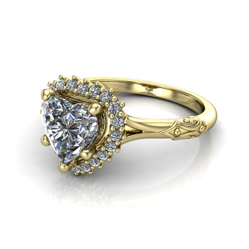 Lillian heart vintage halo engagement ring in 18K Yellow Gold, three-quarter perspective showing the heart center in a squared pav&eacute; halo above an engraved filigree band