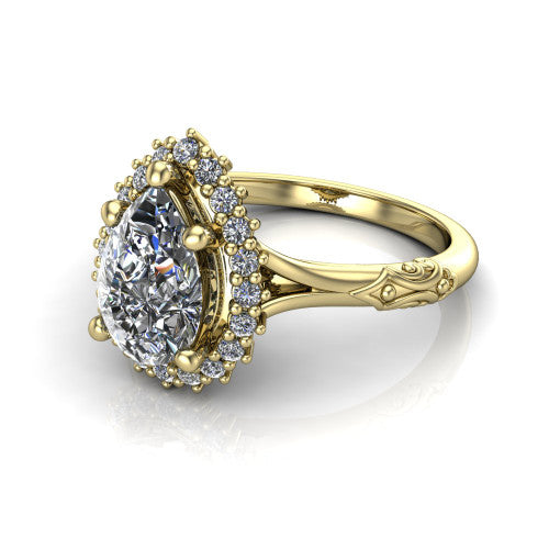 Lillian pear vintage halo engagement ring in 14K Yellow Gold, three-quarter perspective showing the pear center in a squared pav&eacute; halo above an engraved filigree band