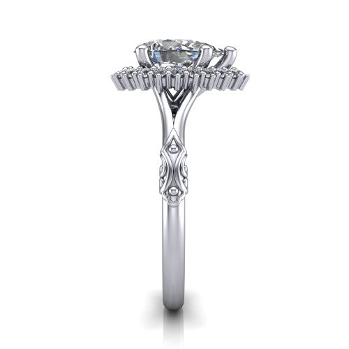 Lillian pear vintage halo engagement ring in Platinum, side profile showing the engraved filigree shoulders, plain band, and squared halo in profile