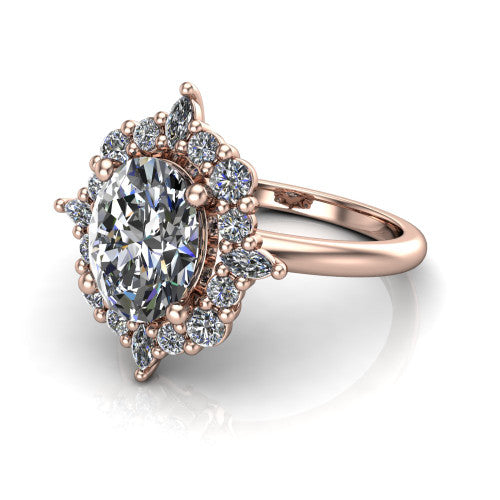 Frances oval vintage halo engagement ring in 18K Rose Gold, three-quarter perspective showing the oval center in a marquise and round starburst halo above a plain band
