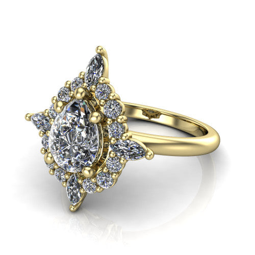 Frances pear vintage halo engagement ring in 14K Yellow Gold, three-quarter perspective showing the pear center in a marquise and round starburst halo above a plain band