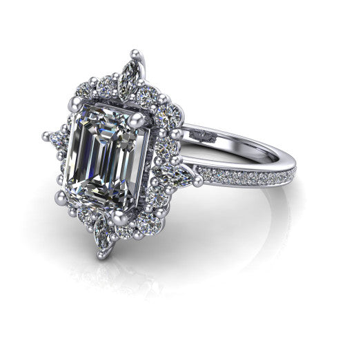 Kali emerald vintage halo engagement ring in 18K White Gold, three-quarter perspective showing the emerald center in a scalloped double pav&eacute; halo with corner accents above a pav&eacute; band
