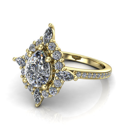 Kali pear vintage halo engagement ring in 18K Yellow Gold, three-quarter perspective showing the pear center in a scalloped double pav&eacute; halo with corner accents above a pav&eacute; band