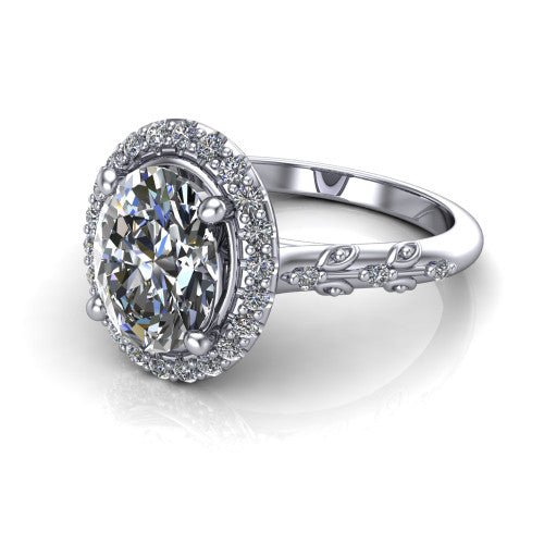 Eleanor oval vintage halo engagement ring in Platinum, three-quarter perspective showing the oval center in a squared pav&eacute; halo above a floral filigree pav&eacute; band