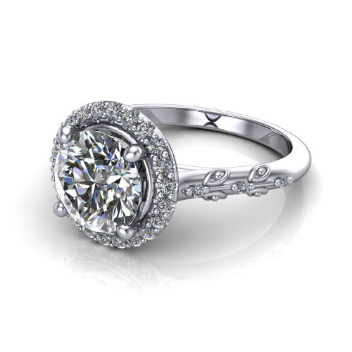 Eleanor round vintage halo engagement ring in Platinum, three-quarter perspective showing the round center in a squared pav&eacute; halo above a floral filigree pav&eacute; band