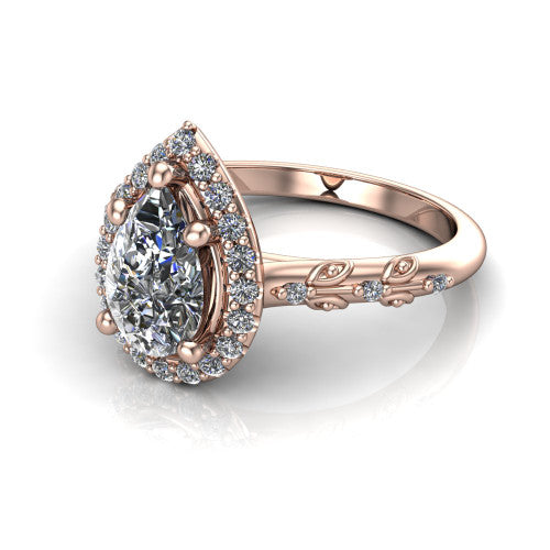 Eleanor pear vintage halo engagement ring in 14K Rose Gold, three-quarter perspective showing the pear center in a squared pav&eacute; halo above a floral filigree pav&eacute; band