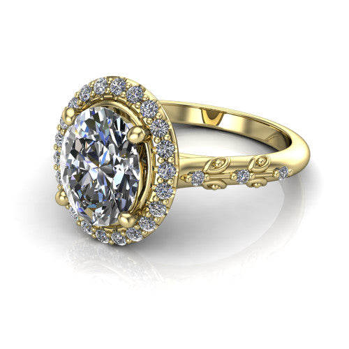 Eleanor oval vintage halo engagement ring in 18K Yellow Gold, three-quarter perspective showing the oval center in a squared pav&eacute; halo above a floral filigree pav&eacute; band