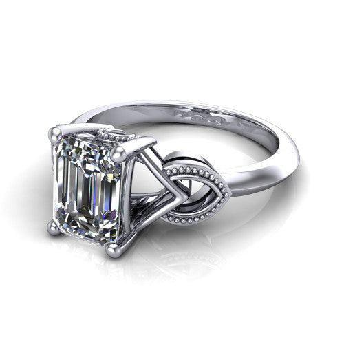 Ella emerald vintage solitaire engagement ring in 18K White Gold, three-quarter perspective showing the emerald center on claw prongs above a plain band with vintage filigree shoulders