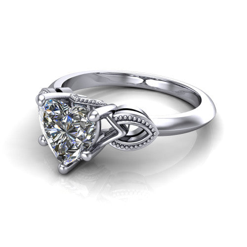 Ella heart vintage solitaire engagement ring in Platinum, three-quarter perspective showing the heart center on claw prongs above a plain band with vintage filigree shoulders