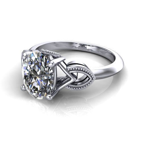 Ella oval vintage solitaire engagement ring in 18K White Gold, three-quarter perspective showing the oval center on claw prongs above a plain band with vintage filigree shoulders