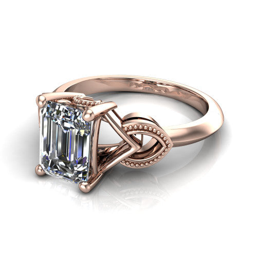 Ella emerald vintage solitaire engagement ring in 18K Rose Gold, three-quarter perspective showing the emerald center on claw prongs above a plain band with vintage filigree shoulders