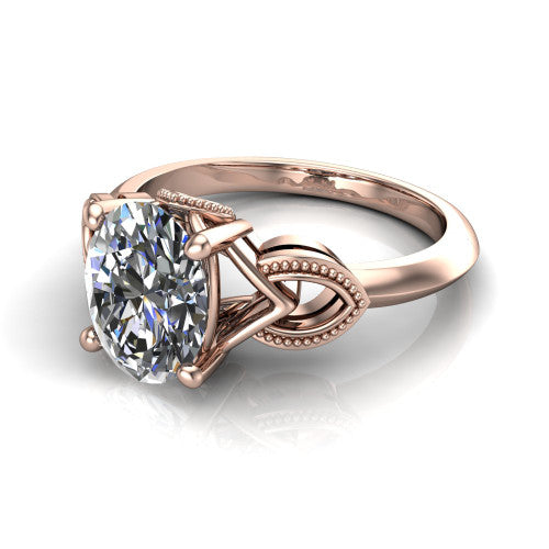 Ella oval vintage solitaire engagement ring in 14K Rose Gold, three-quarter perspective showing the oval center on claw prongs above a plain band with vintage filigree shoulders