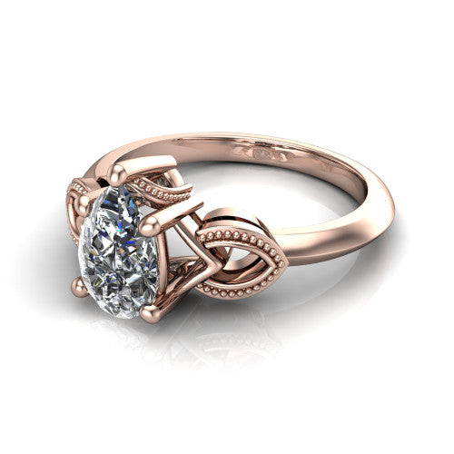 Ella pear vintage solitaire engagement ring in 14K Rose Gold, three-quarter perspective showing the pear center on claw prongs above a plain band with vintage filigree shoulders