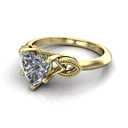 Ella heart vintage solitaire engagement ring in 18K Yellow Gold, three-quarter perspective showing the heart center on claw prongs above a plain band with vintage filigree shoulders