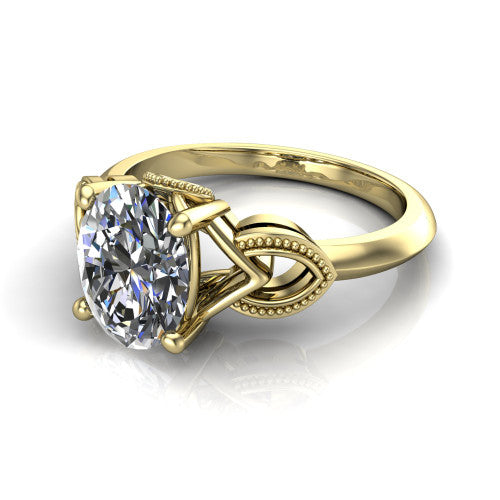 Ella oval vintage solitaire engagement ring in 18K Yellow Gold, three-quarter perspective showing the oval center on claw prongs above a plain band with vintage filigree shoulders