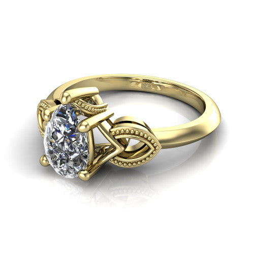 Ella pear vintage solitaire engagement ring in 18K Yellow Gold, three-quarter perspective showing the pear center on claw prongs above a plain band with vintage filigree shoulders