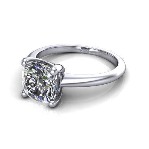 Avery cushion classic solitaire engagement ring in Platinum, three-quarter perspective showing the cushion center on claw prongs above a plain polished band