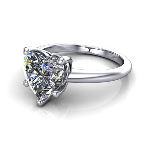 Avery heart classic solitaire engagement ring in 18K White Gold, three-quarter perspective showing the heart center on claw prongs above a plain polished band