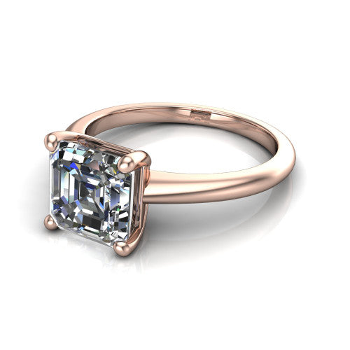 Avery square emerald classic solitaire engagement ring in 14K Rose Gold, three-quarter perspective showing the square emerald center on claw prongs above a plain polished band