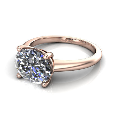 Avery oval classic solitaire engagement ring in 14K Rose Gold, three-quarter perspective showing the oval center on claw prongs above a plain polished band