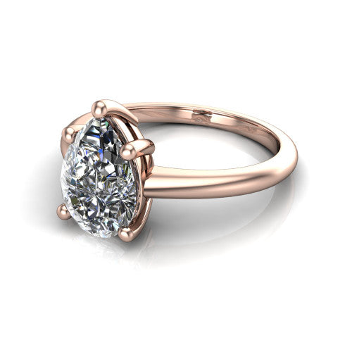 Avery pear classic solitaire engagement ring in 18K Rose Gold, three-quarter perspective showing the pear center on claw prongs above a plain polished band