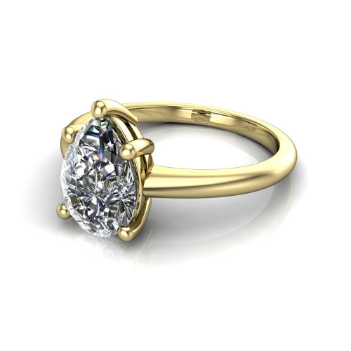 Avery pear classic solitaire engagement ring in 18K Yellow Gold, three-quarter perspective showing the pear center on claw prongs above a plain polished band