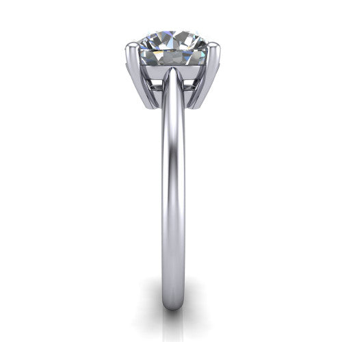 Avery round classic solitaire engagement ring in 18K White Gold, side profile showing the smooth polished band and the open basket beneath the round center