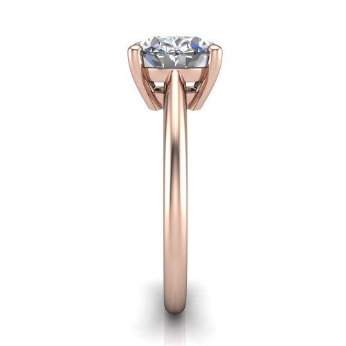 Avery oval classic solitaire engagement ring in 18K Rose Gold, side profile showing the smooth polished band and the open basket beneath the oval center