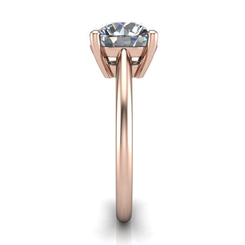 Avery round classic solitaire engagement ring in 14K Rose Gold, side profile showing the smooth polished band and the open basket beneath the round center
