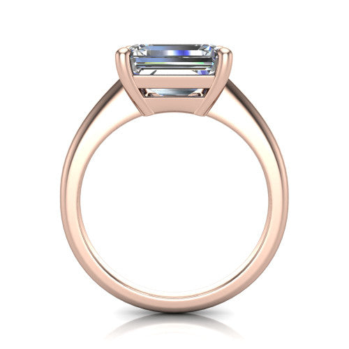 Avery emerald classic solitaire engagement ring in 18K Rose Gold, through-finger front profile showing the emerald center raised above the plain band