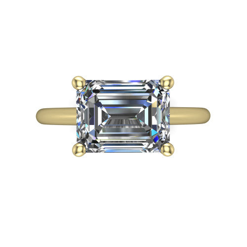 Avery emerald classic solitaire engagement ring in 14K Yellow Gold, top-down view showing the four-prong emerald solitaire center