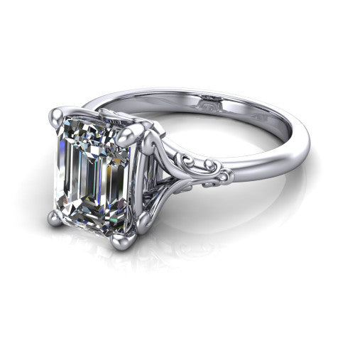 Dorothy emerald vintage solitaire engagement ring in 14K White Gold, three-quarter perspective showing the emerald center on claw prongs above a plain band with vintage filigree scrollwork