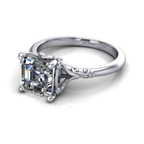Dorothy square emerald vintage solitaire engagement ring in Platinum, three-quarter perspective showing the square emerald center on claw prongs above a plain band with vintage filigree scrollwork