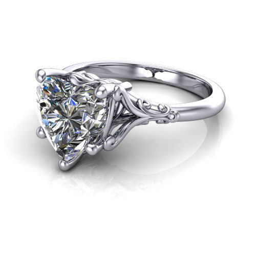 Dorothy heart vintage solitaire engagement ring in 14K White Gold, three-quarter perspective showing the heart center on claw prongs above a plain band with vintage filigree scrollwork
