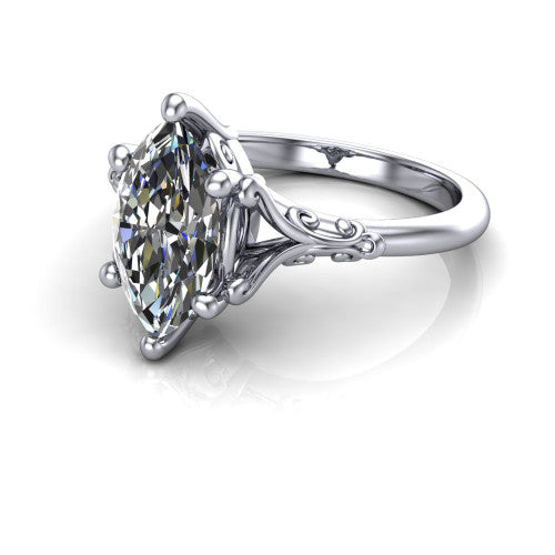Dorothy marquise vintage solitaire engagement ring in Platinum, three-quarter perspective showing the marquise center on claw prongs above a plain band with vintage filigree scrollwork