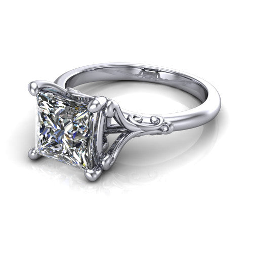 Dorothy princess vintage solitaire engagement ring in 14K White Gold, three-quarter perspective showing the princess center on claw prongs above a plain band with vintage filigree scrollwork
