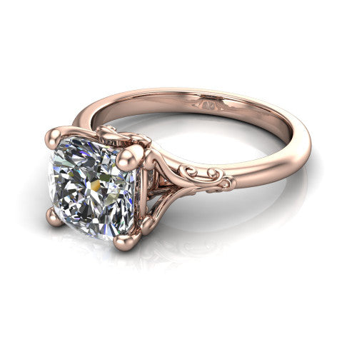 Dorothy cushion vintage solitaire engagement ring in 18K Rose Gold, three-quarter perspective showing the cushion center on claw prongs above a plain band with vintage filigree scrollwork
